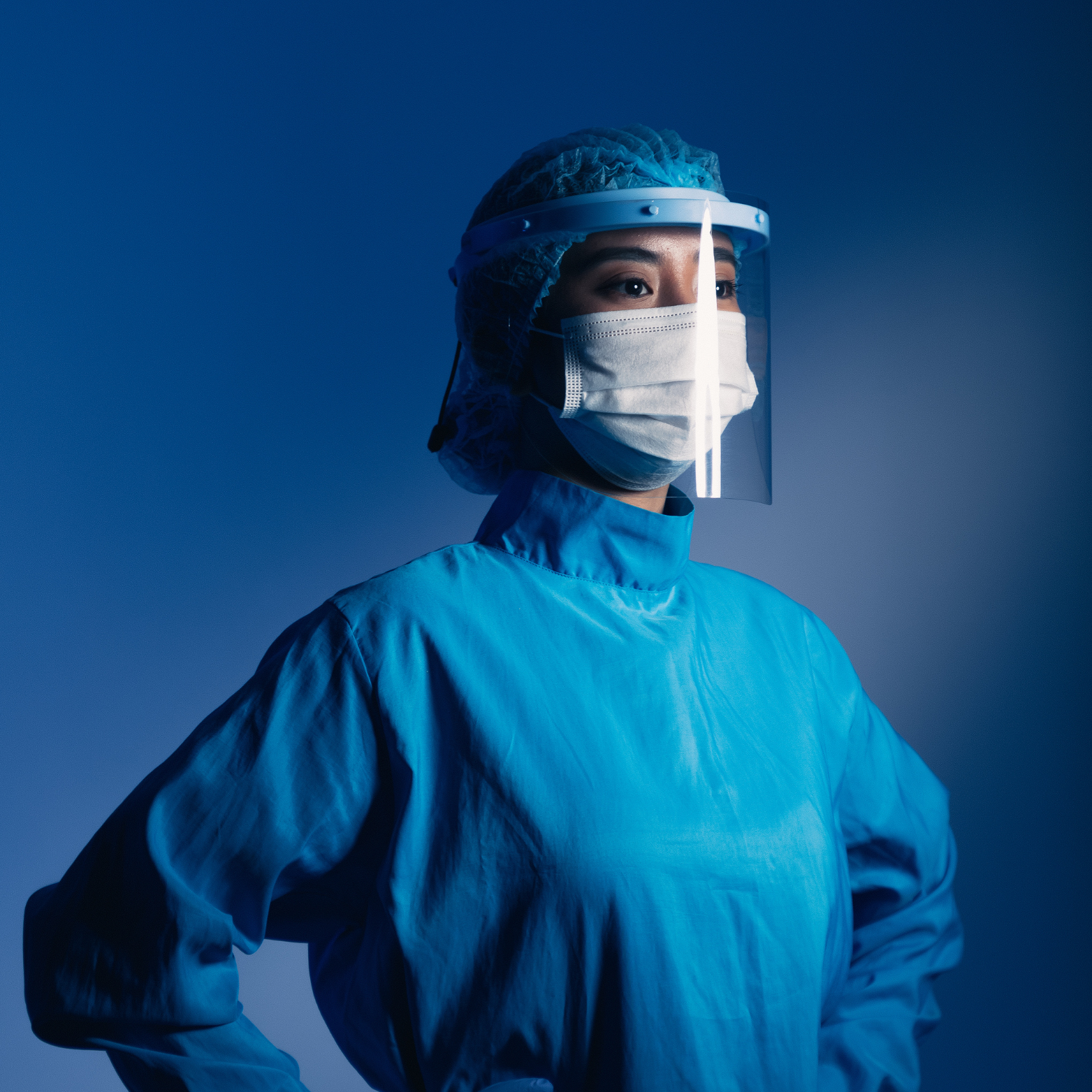 Medical Expert Consultation - Professional healthcare provider in full protective equipment ready for patient care